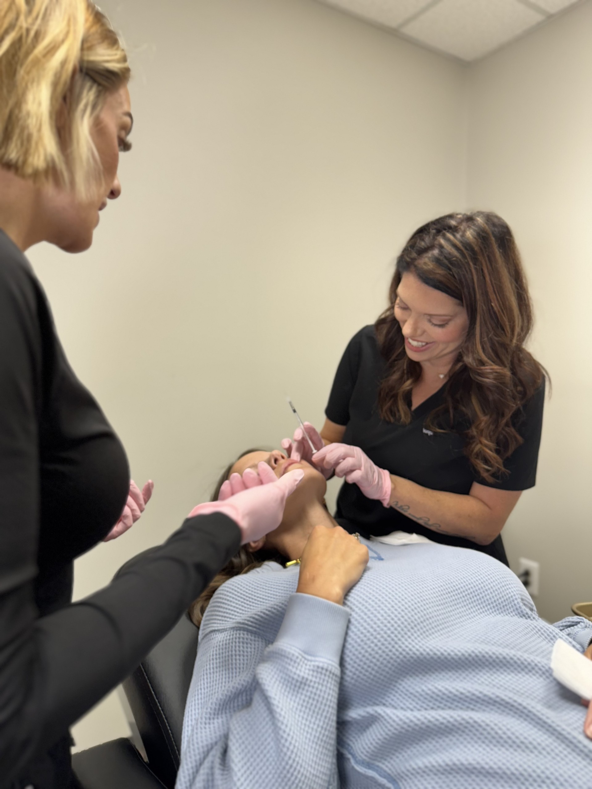 Care Esthetics Delaware providers performing an injectable treatment